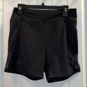 PINK black biker shorts with mesh on the sides. No stains or holes